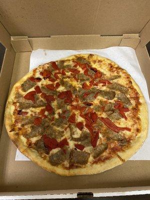 Brooklyn Special Pizza - Italian sausage, red roasted peppers and mozzarella cheese supposed to be a large looks small but tasty