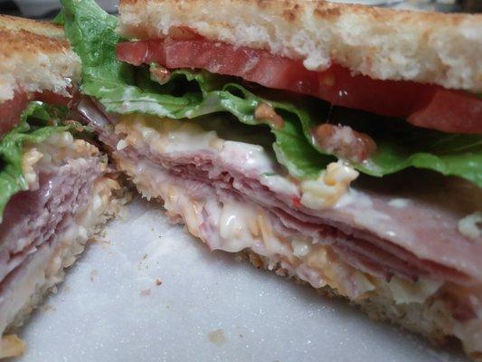 Pimiento Turkey - homemade pimiento cheese, turkey pastrami, lettuce & tomato