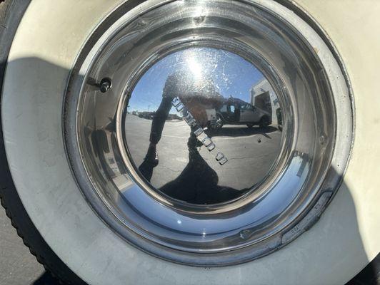 Bill's Buick's left front tire and hubcap.