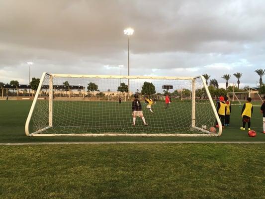 Watching from behind the goal