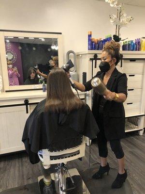 Granddaughter #2 getting her haircut.