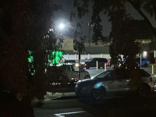 10pm parking lot jam. Love the headlights coming into my front room.