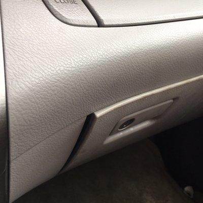 My car came back from an oil change with a damaged glove compartment door.