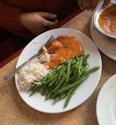 My sister's dish. It could've been Chicken Korma, but please don't quote me! She said is was delicious. The green beans were very fresh!