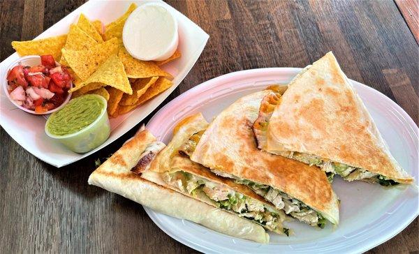 STEAK OR CHICKEN QUESADILLA LETTUCE, TOMATO,RED ONION,AVOCADO,PROVOLONE & CHEDDER CHEESE IN A FLOUR TORTILLA