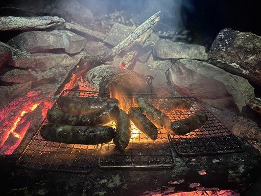 Sausages on the campfire.