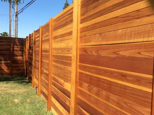 Horizontal redwood privacy fence