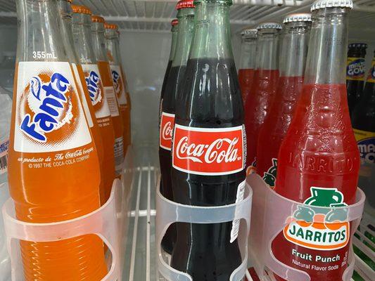 Fanta and Coca cola product available in soda category, prefered african and mexican drinks