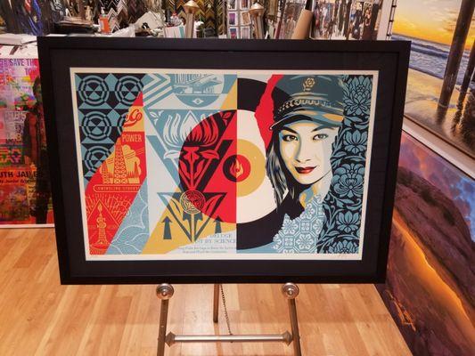 Obey art framed with museum glass