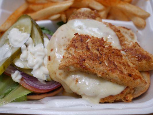 Gourmet Chicken Sandwich with Fries. XL chicken breast, seaoned "American" style.  Ask for the dressing on the side.