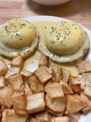 Eggs Benedict perfection!  With potato's.