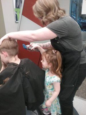 Alisha let little sister help cut brother's hair! So sweet!