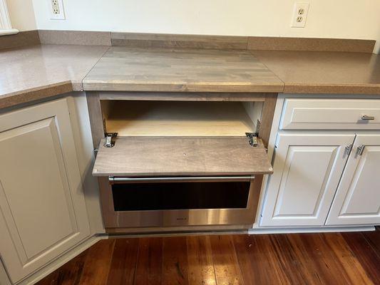 storage for sheet pans in custom base cabinet