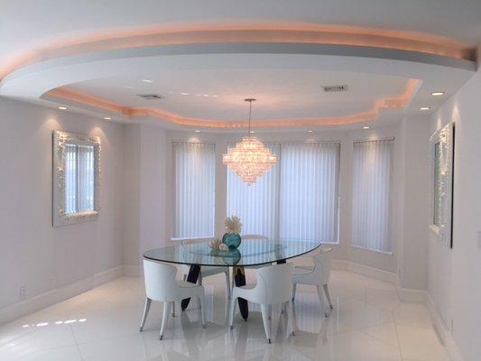 Beach House Dining Room, Interior Architecture by Glen C. Kinnaird, table by Murano Dining Table and Steeple Chairs by Roche-BoBois USA.