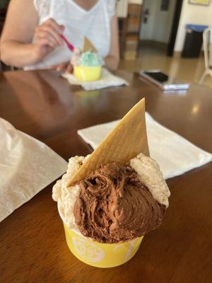 a three scoop medium with dark chocolate, cookie butter, and birthday cake!