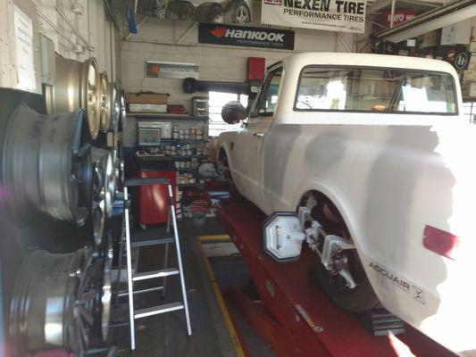 Lowered car and truck friendly.  Here is my '68 C10 we l on air ride getting straightened out.