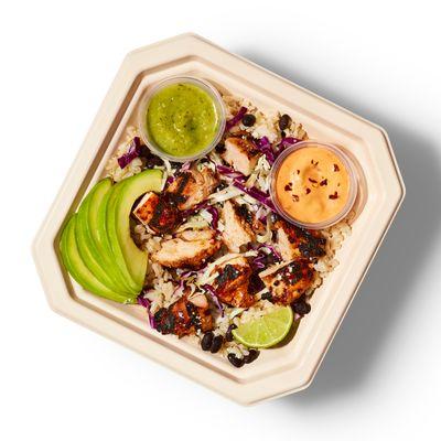 Dave's Taco Bowl - cilantro lime brown rice, black beans, and NEW blackened chicken - topped with Chipotle crema and salsa verde drizzle.