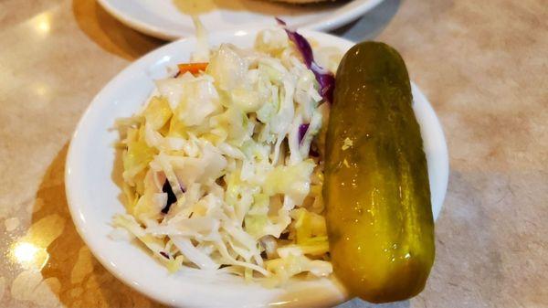 Coleslaw and dill pickle