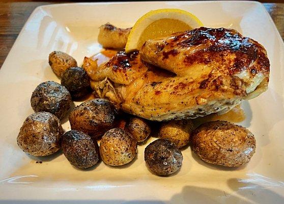 Half Chicken with Rosemary & Olive Oil Roasted Potatoes. Delicious.