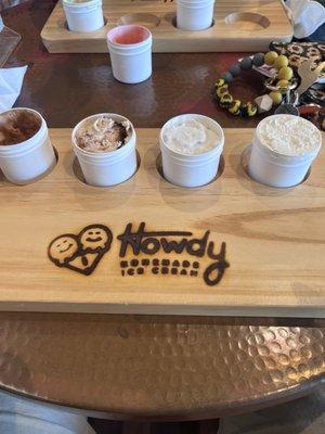 Flight of ice team with coconut, cookies and cream, brownie batter, and fudge swirl.