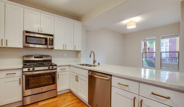 Large kitchens with ample cabinet and countertop space