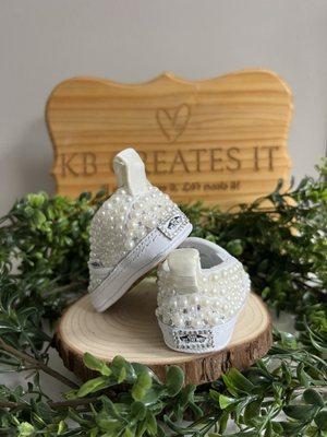 Custom pearls and bling baby shoes.