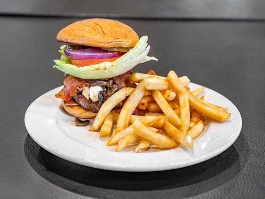 1/2 lb. fresh ground beef patty, blue cheese, bacon, sautéed, mushrooms, lettuce, tomato, mayo and onion served on a brioche bun