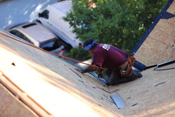 A starter strip, being installed here, is crucial for the life and benefit of your roof.