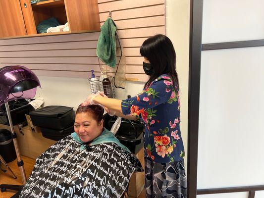 My wife's getting her hair washed.