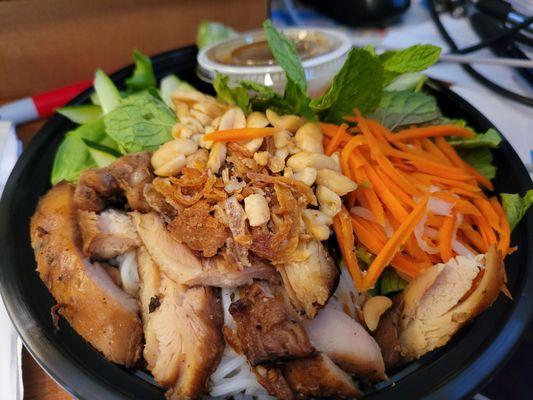 Grilled chicken salad bowl with rice noodles on bottom.  It's my favorite!