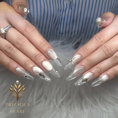 This holiday season, let your nails steal the spotlight!  Book your rhinestone nail art today and get ready to shine!