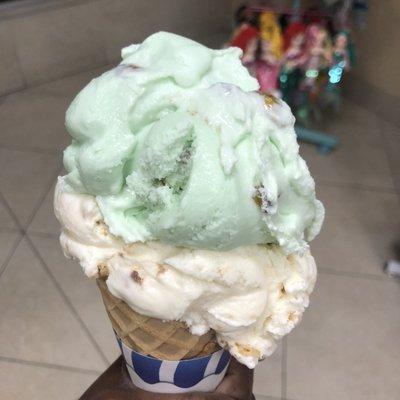 Toasted Coconut and Pistachio Ice Cream in a waffle cone.