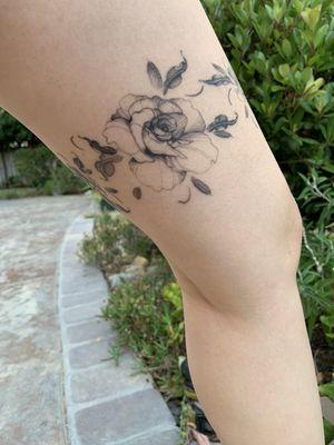 Tattoo by way.ink (black roses wrapping around thigh/scar cover up)