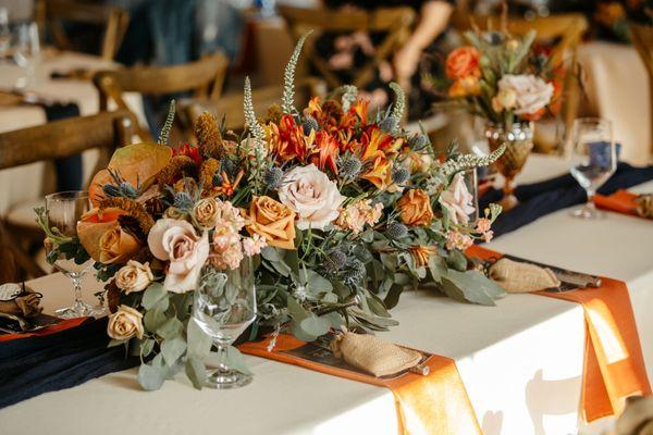 Centerpieces (repurposed from the aisle during the ceremony)