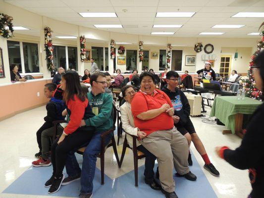 Staff playing games at our Holiday Party