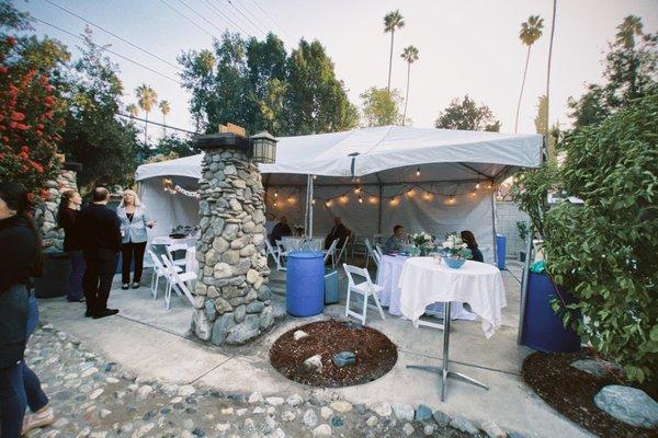 Our backyard wedding celebration with canopies and tables from A&H Party Rentals