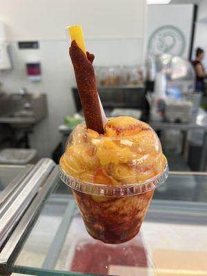 Mangonada (small) with pineapple and mango/chamoy sorbet. A little spicy and a lot delicious.