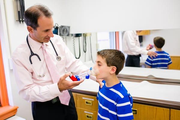 Dr. Louis Vernacchio with a patient