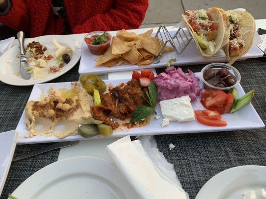 (3) fish tacos and the Mediterranean Appetizer plate. Delicious and perfect with the day drinks.