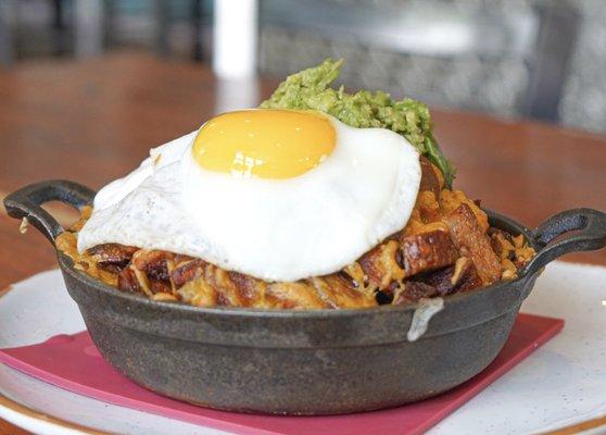 Loaded Breakfast Bowl | Home Fries, Cheddar, Caramelized Onions, Diced Chorizo, Avocado, Sour Cream, Sunny Side Up Egg