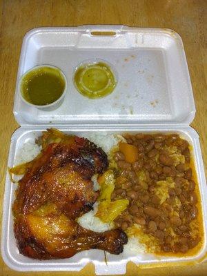 Super Flavorful Baked Chicken with Rice and Beans. Housemate Green Hot Sauce is Tastefully Spicy!