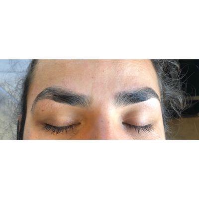 Thick brows.