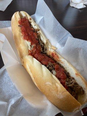 Cheese Steak with sauce and onions