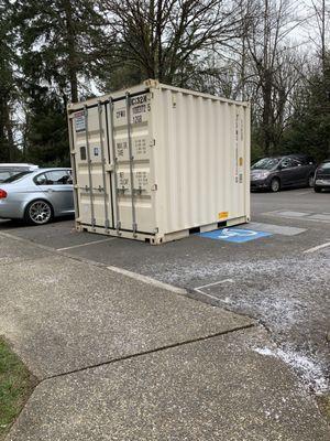 Wheelchair parking space outside is blocked