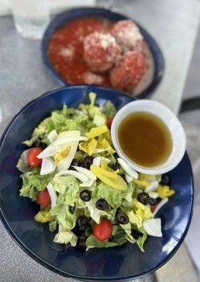 Salad and meatballs