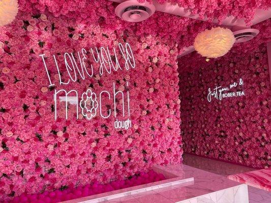 Inside pink floral decor with ball pit that kids can play in