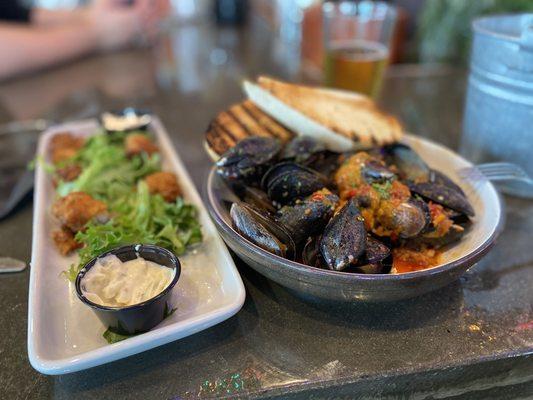 Grouper bites and mussels in sweet and spicy sauce.