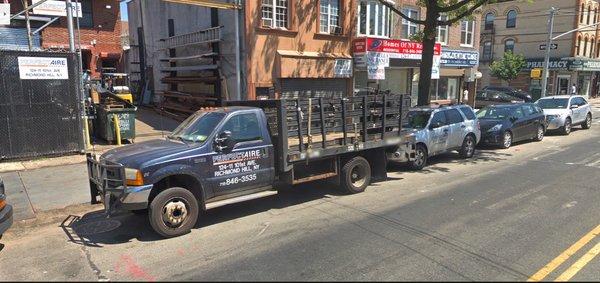 one of their transport trucks from their fleet they use for commercial ac systems