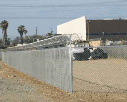 Our Orange County chain link fences can have barbed wire or razor wire added along the top rail.