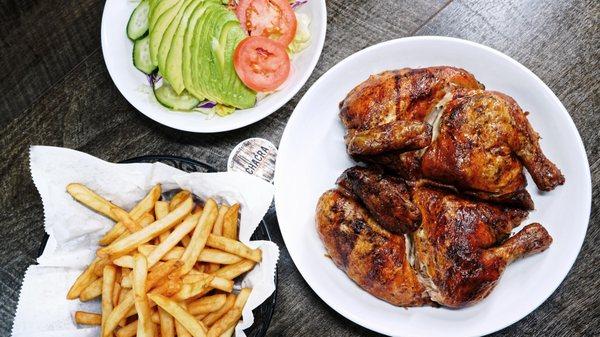 Combo Clasico: Whole Chicken, salad and fries.